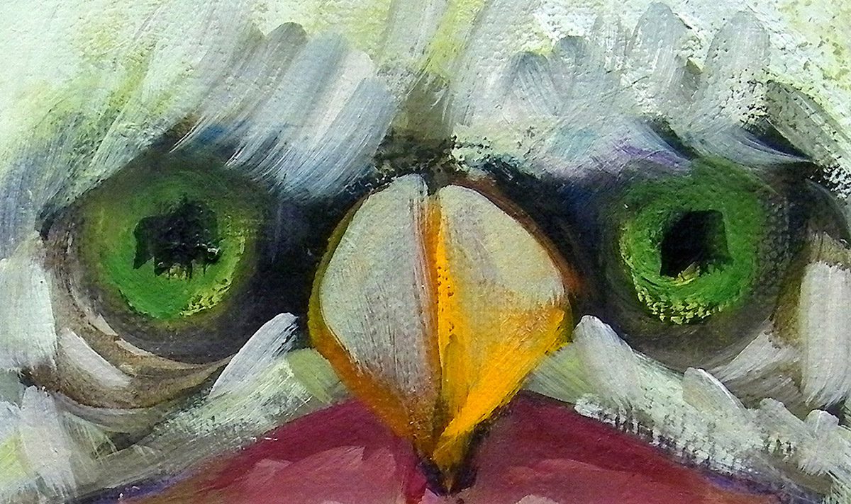 A painting of an eagle 's face with green eyes.